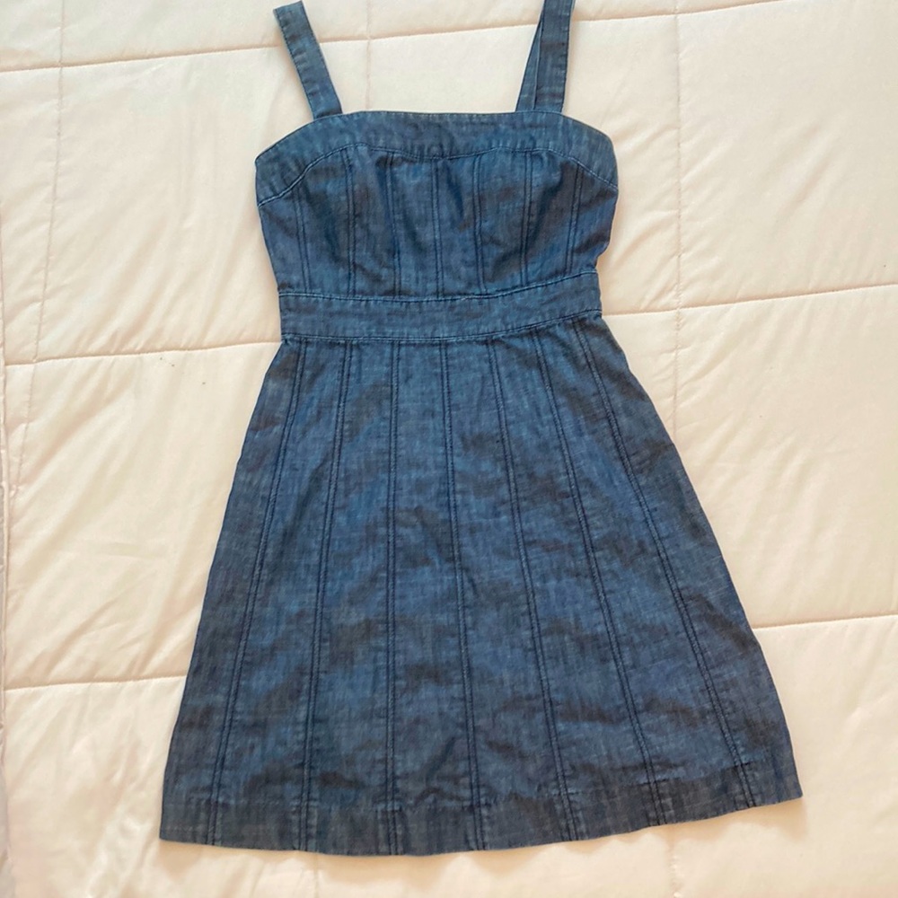 Mini denim dress with adjustable straps and zipper